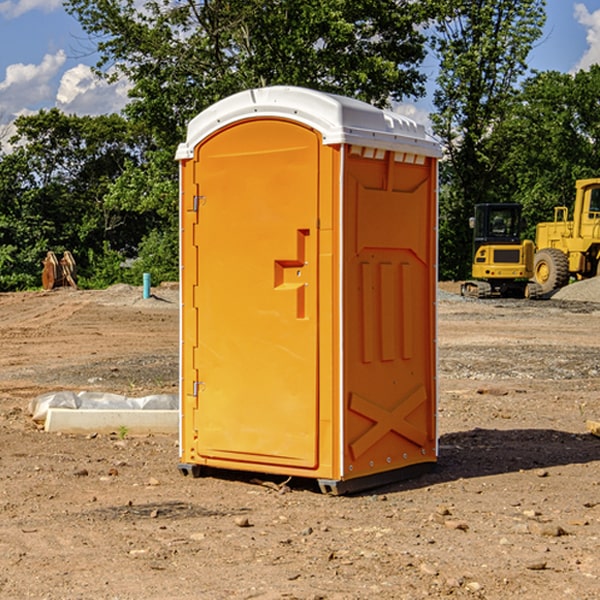 how often are the portable restrooms cleaned and serviced during a rental period in Lind Wisconsin